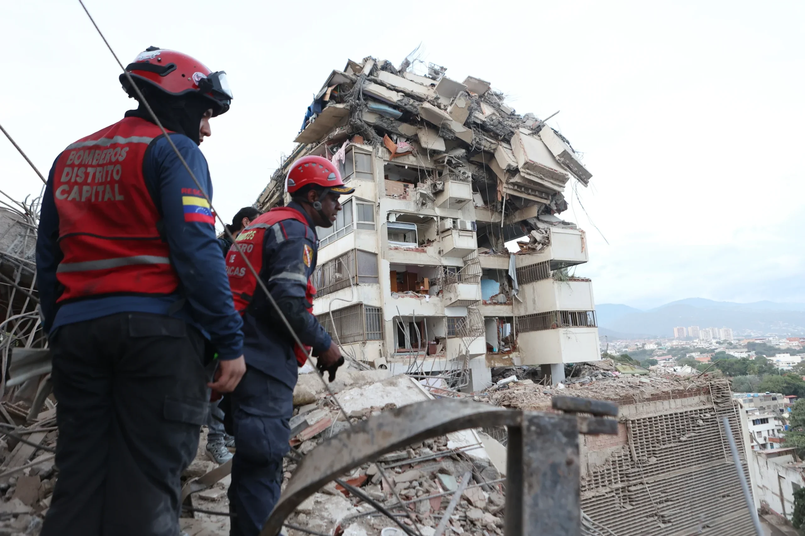 A family amid the destruction after the June 2026 Venezuela earthquakes